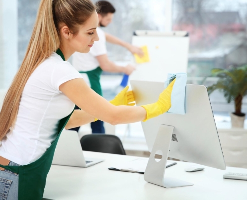 Worker cleaning office space