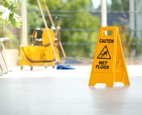Wet floor sign on floor